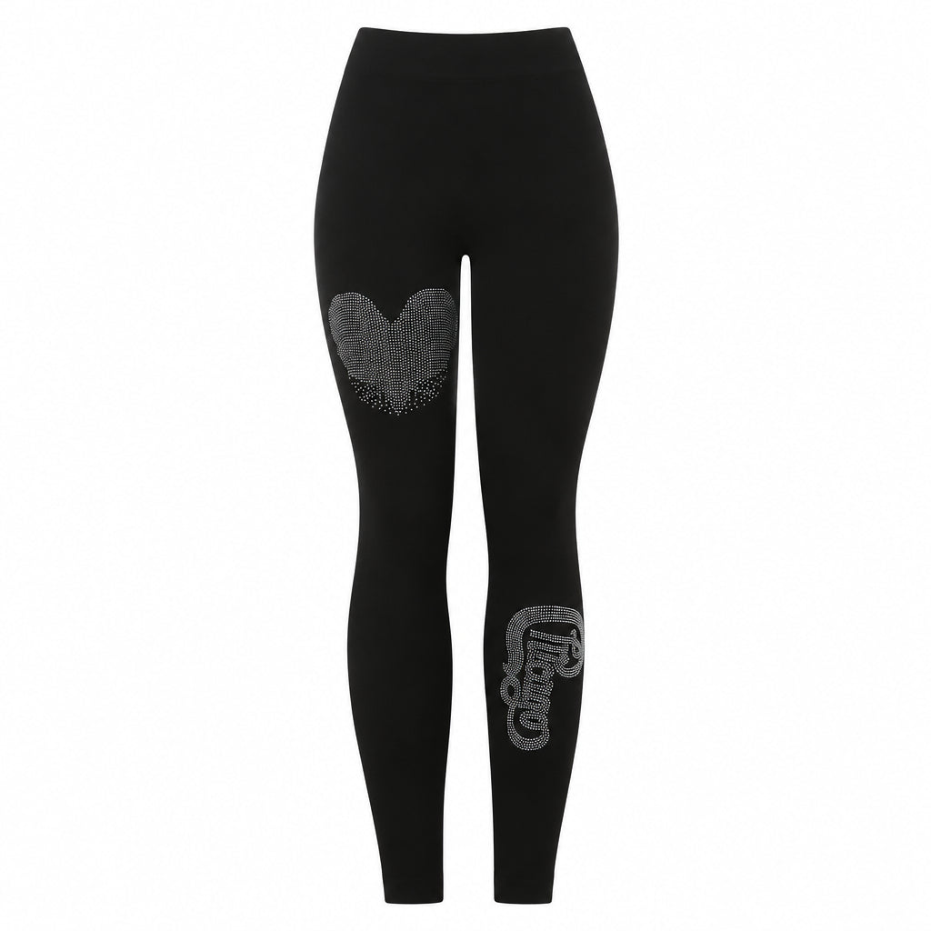 A pair of black leggings with a design on the left leg.