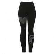 A pair of black leggings with a design on the left leg.