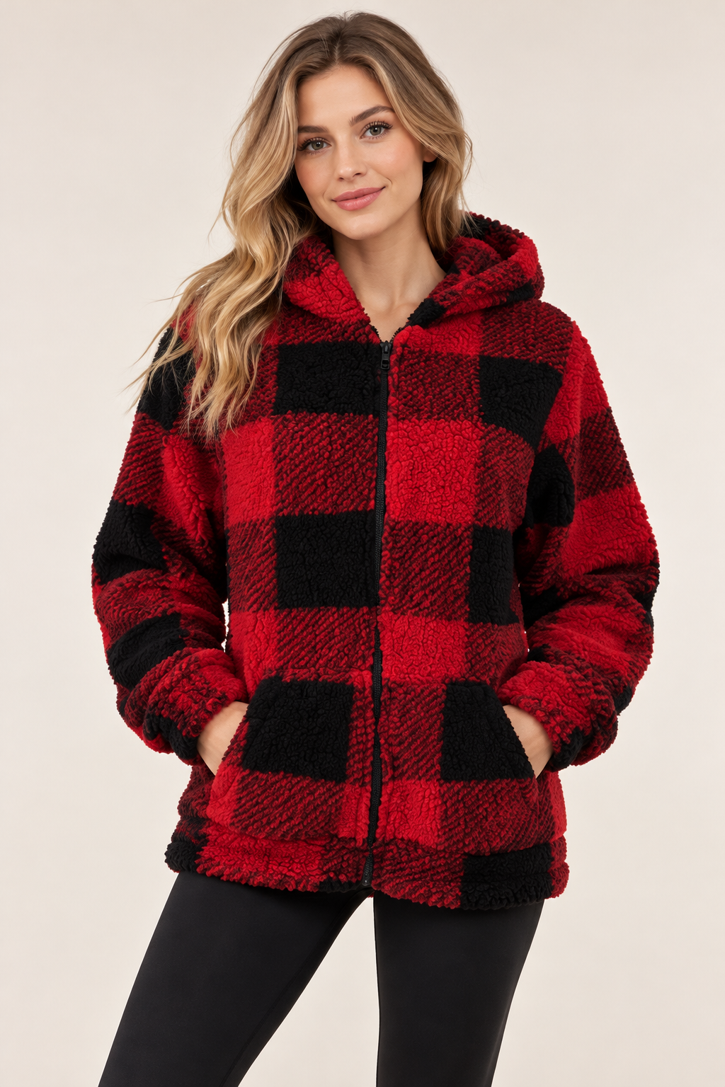 Model wearing the red buffalo-plaid jacket