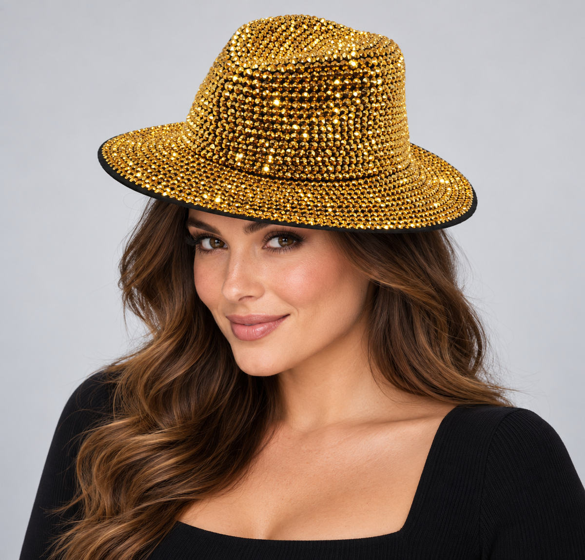 Model wearing the CA054 gold rhinestone fedora with black brim edge