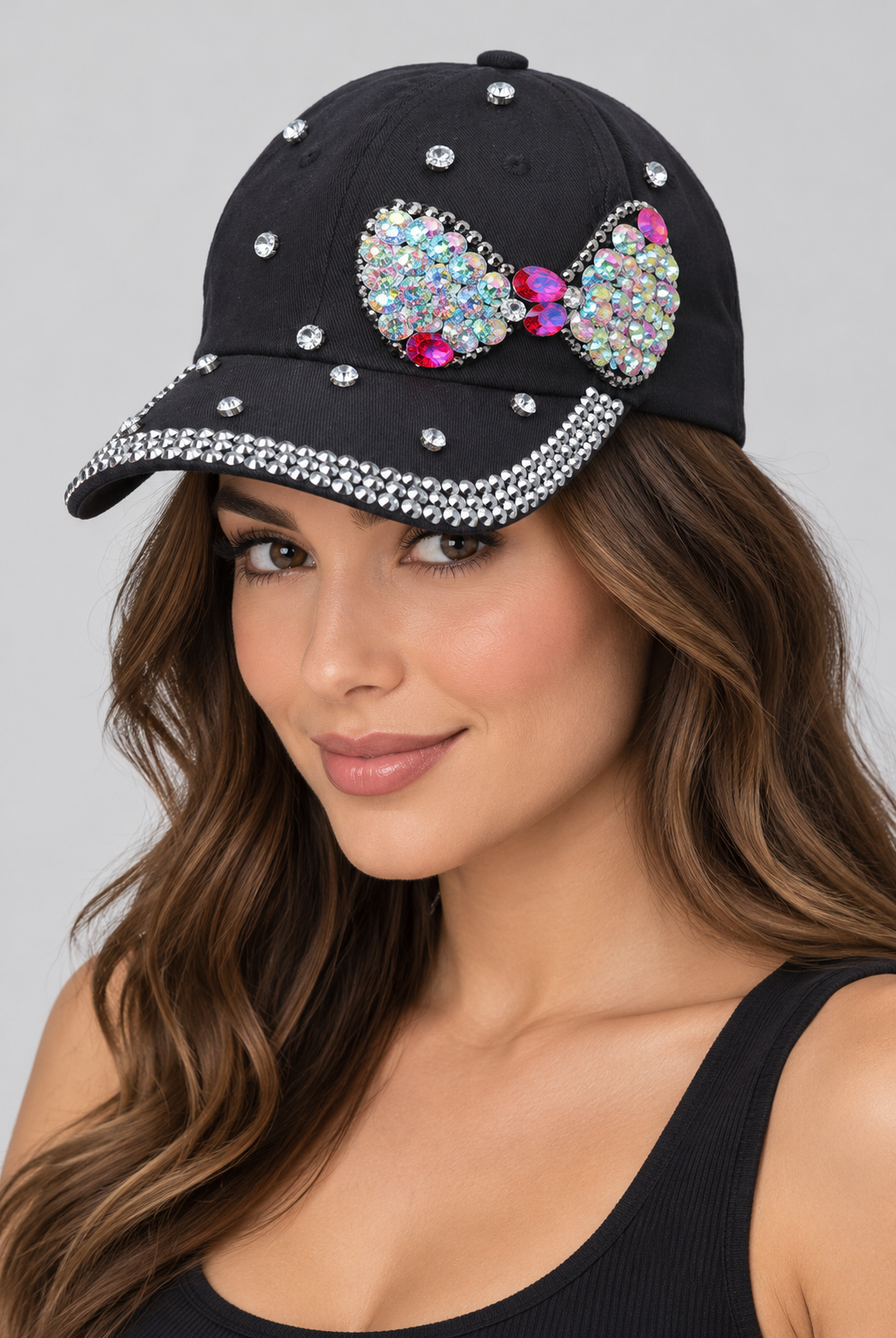 Human model wearing Denim Baseball Cap: CA036 Black Baseball Cap w/ Black Rhinestone Bow