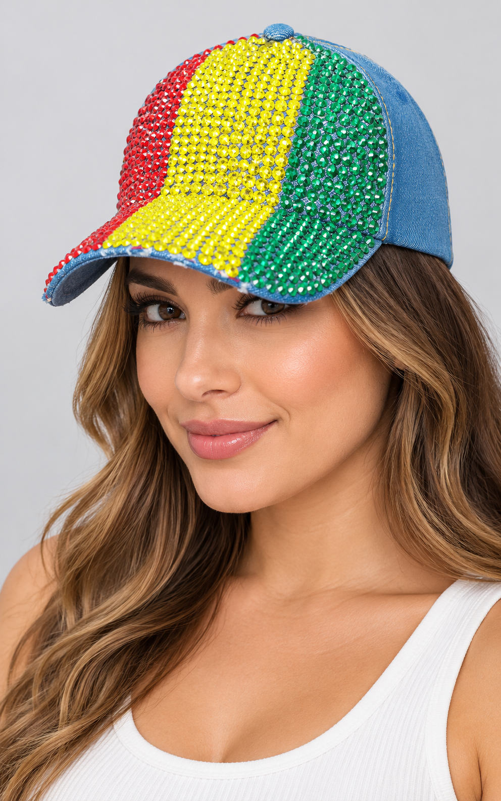 Human model wearing Denim Rhinestone Baseball Cap: CA19029-2 Red, Yellow & Green Stones