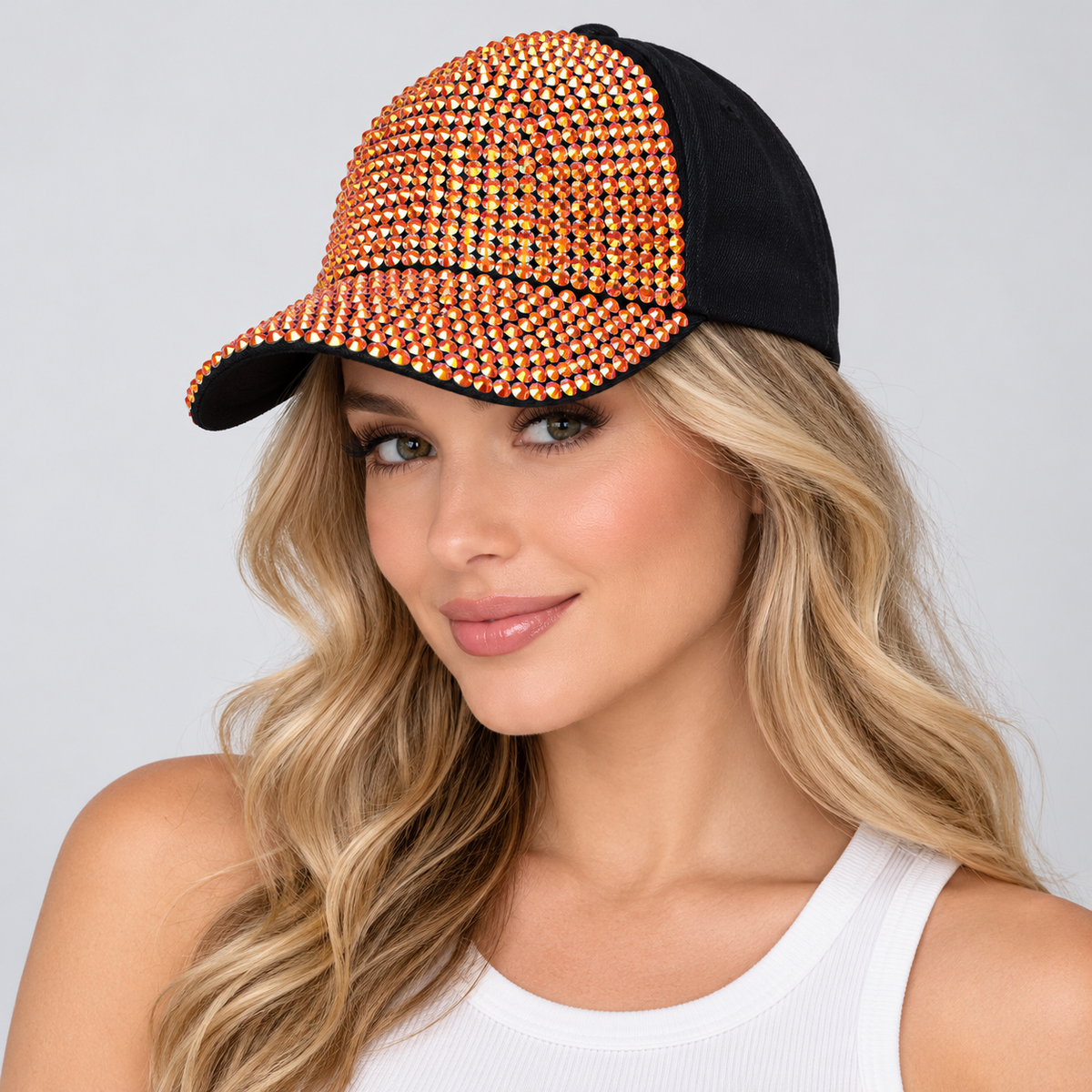 Human model wearing Denim Rhinestone Baseball Cap: CA025 Black Denim & Orange Stone