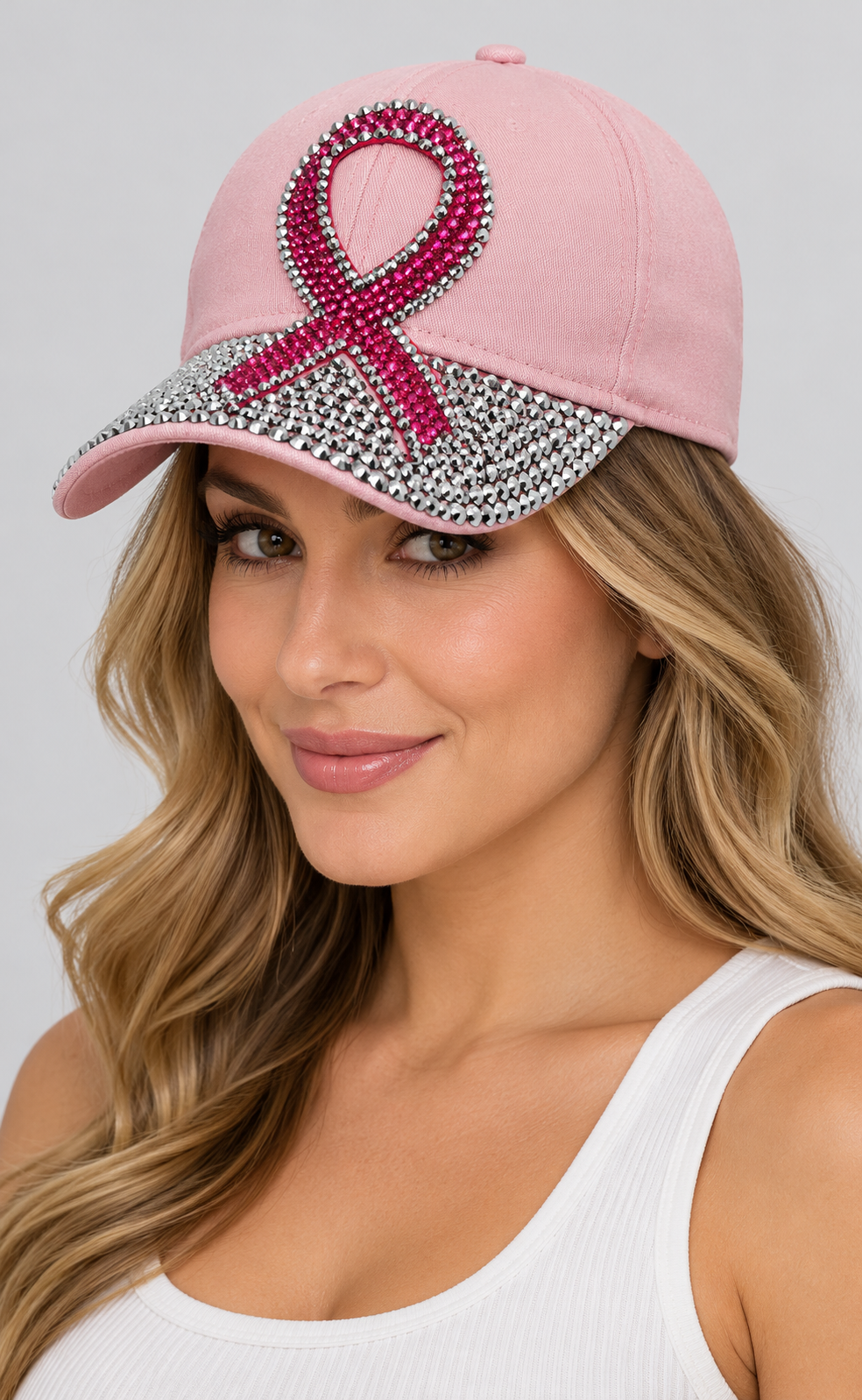 Human model wearing Denim Baseball Cap: CA030 Breast Cancer Awareness Pink Denim & Pink Stone