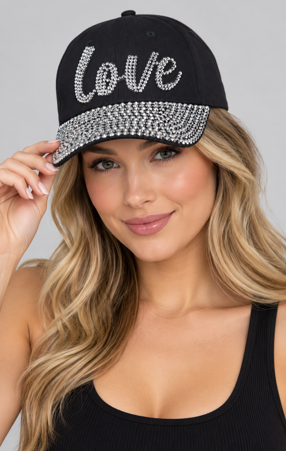 Human model wearing Denim Baseball Cap: CA004 "Love" Baseball Cap In Black Denim