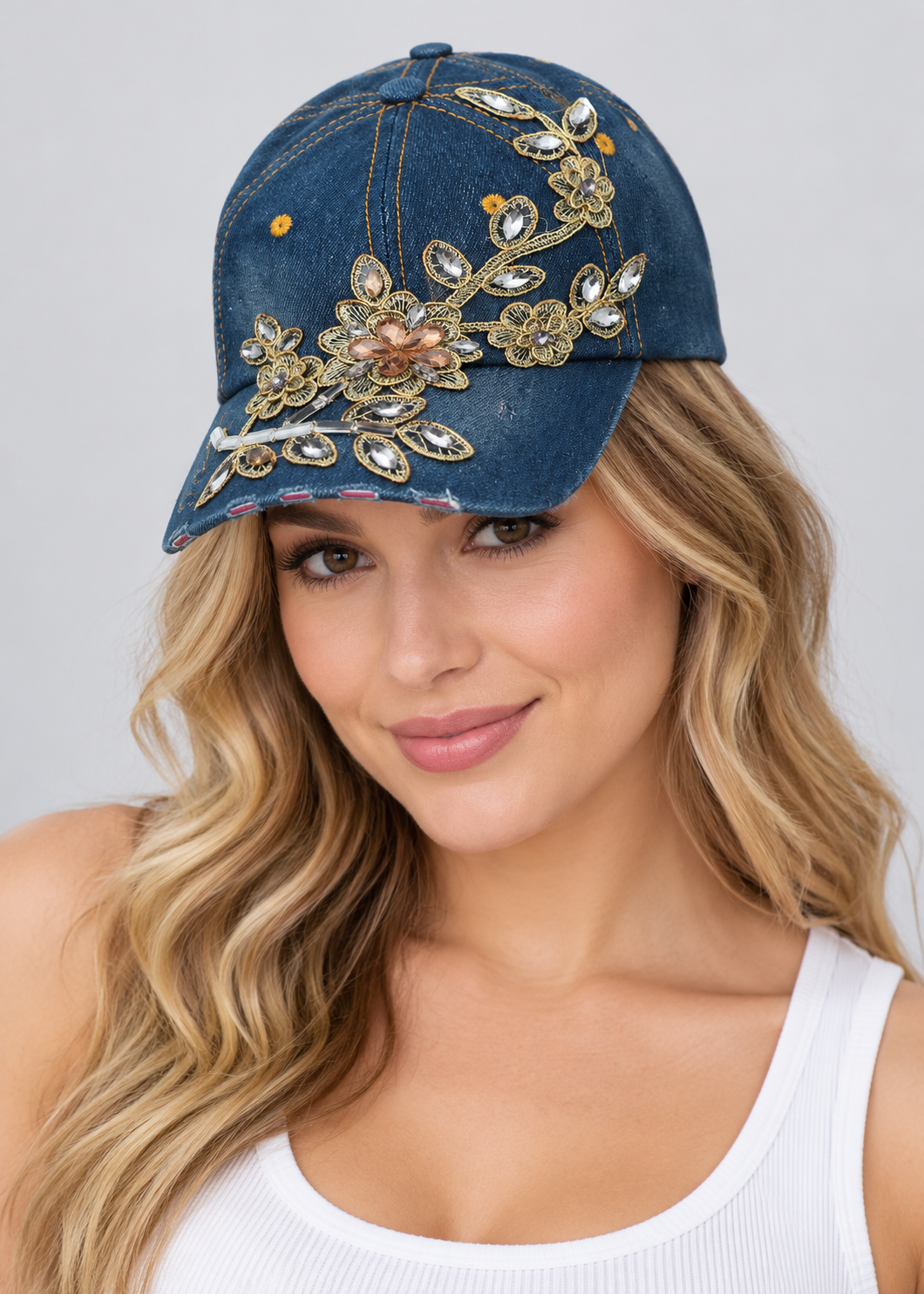 Human model wearing Denim Baseball Cap: CA1478 Embroidered Flower Design on Denim Cap